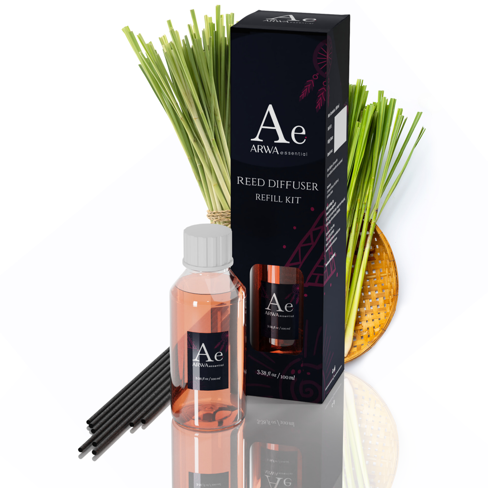 ARWA Essential Lemongrass Reed Diffuser Refill Kit - 100ml fragrance oil bottle with 8 premium black reed sticks and packaging box, lemongrass stalks in background