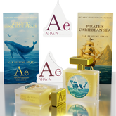 ARWA Essential Atlantic Cool Blue Whale and Pirate's Caribbean Sea 50ml car perfume spray combo – packaging boxes and glass bottles with gold caps on stone display, Oceanic Serenity Collection