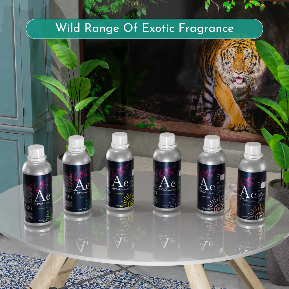 ARWA Essential wild range of exotic fragrance 1 litre diffuser oil bottles displayed on table with tiger backdrop