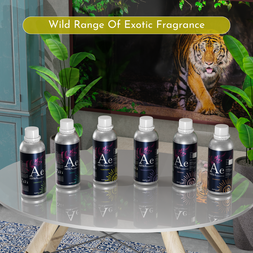 ARWA Essential wild range of exotic fragrance 1 litre diffuser oil bottles displayed on table with tiger backdrop