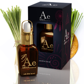 ARWA Essential Lemongrass Essential Oil 20ml amber glass dropper bottle with gold cap and packaging box, lemongrass stalks in background