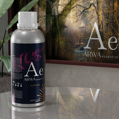 ARWA Essential Agarwood Oud Aroma Diffuser Oil 1 Litre silver bottle displayed with forest path backdrop home fragrance scene