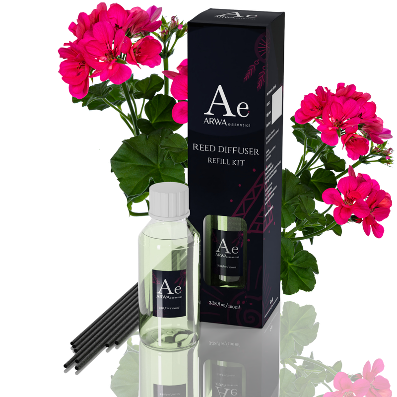 ARWA Essential Geranium Reed Diffuser Refill Kit - 100ml fragrance oil bottle with 8 premium black reed sticks and packaging box, pink geranium flowers in background