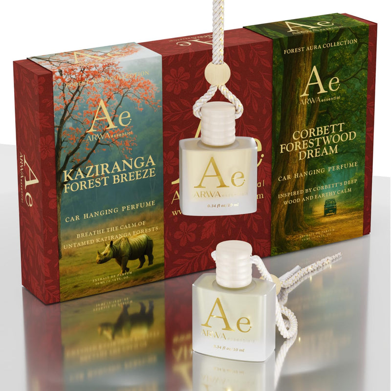 ARWA Essential Kaziranga Forest Breeze and Corbett Forestwood Dream 10ml hanging car perfume duo - packaging boxes and glass bottles with braided cords, angled view