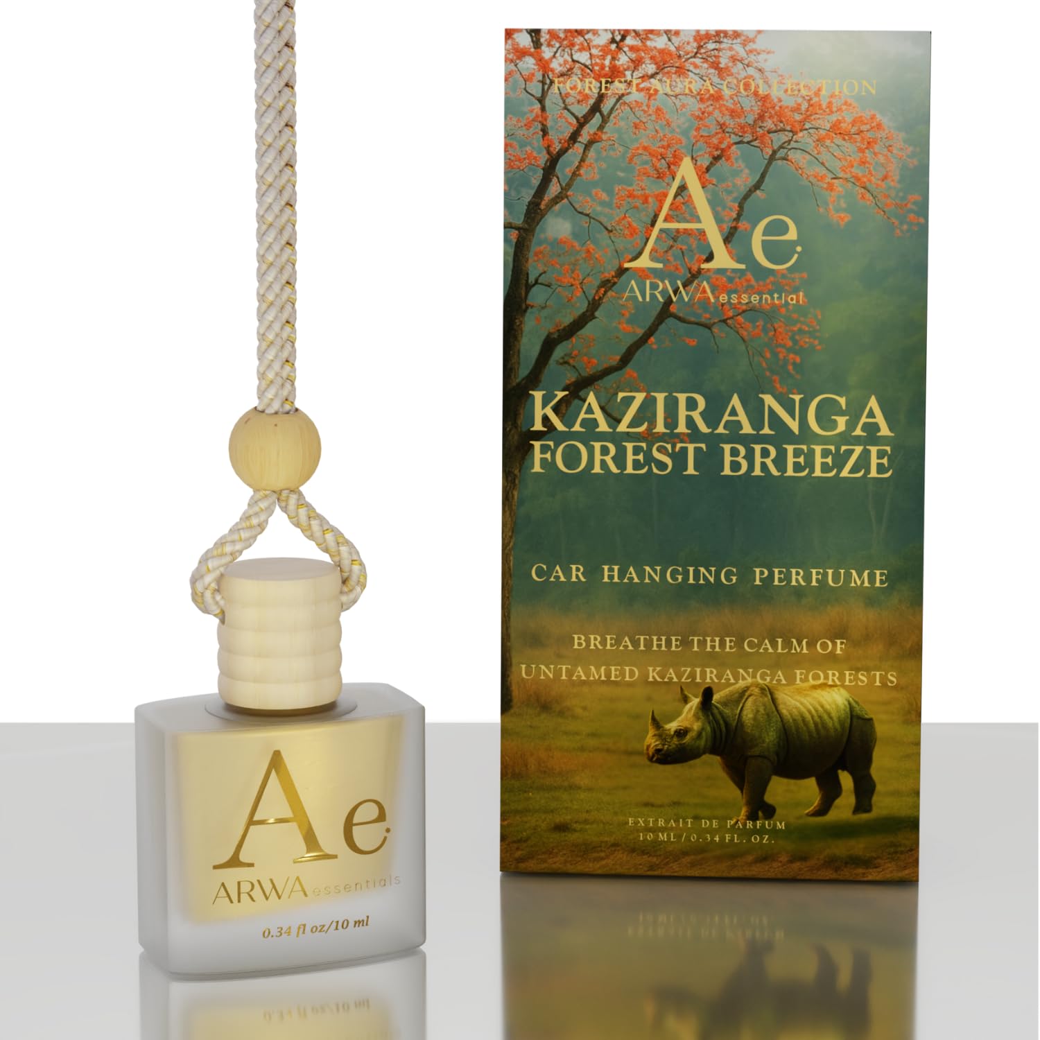 ARWA Essential Kaziranga Forest Breeze 10ml hanging car perfume - glass bottle with wooden cap and braided cord next to packaging box