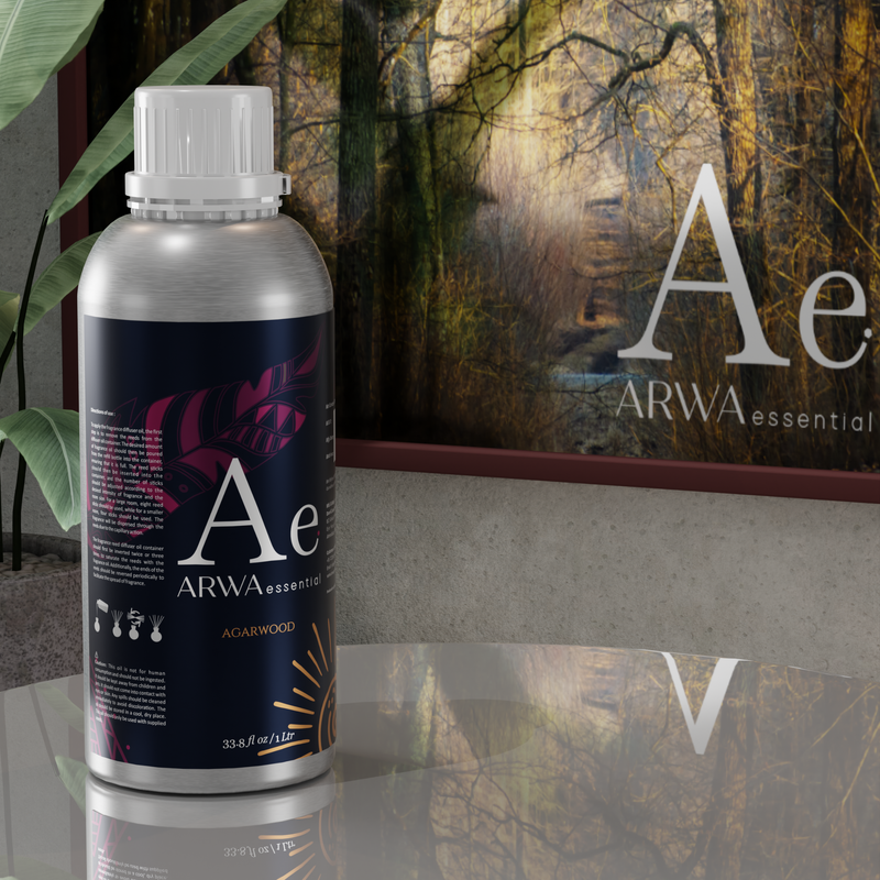 ARWA Essential Agarwood Oud Aroma Diffuser Oil 1 Litre silver bottle displayed with forest path backdrop home fragrance scene