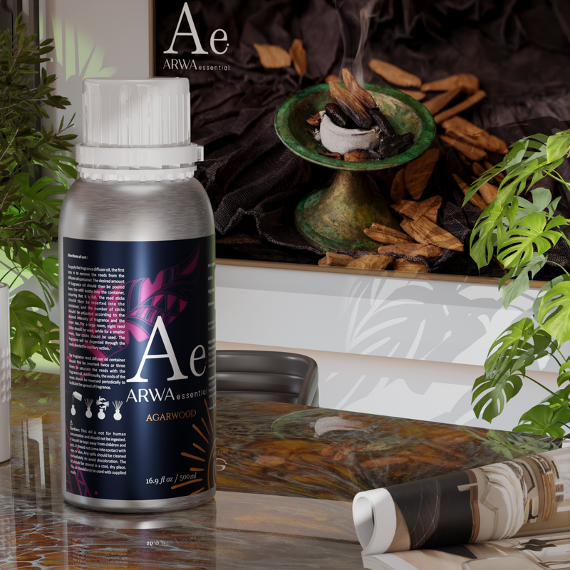 ARWA Essential Agarwood Oud Aroma Diffuser Oil 500ml silver bottle displayed on table with incense burner and agarwood chips home fragrance scene